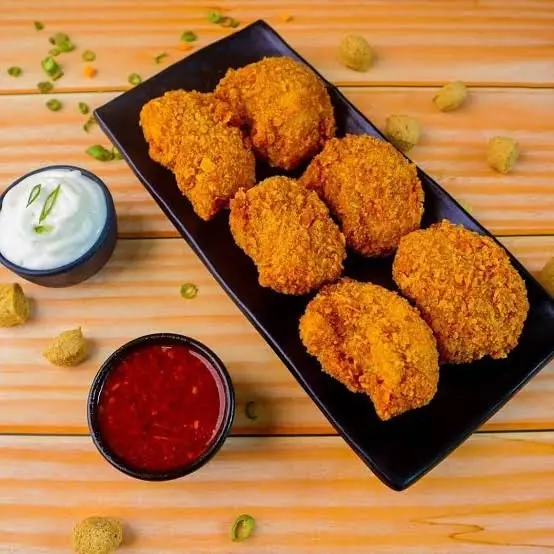 Kurkurey Chicken Momo ( Half)